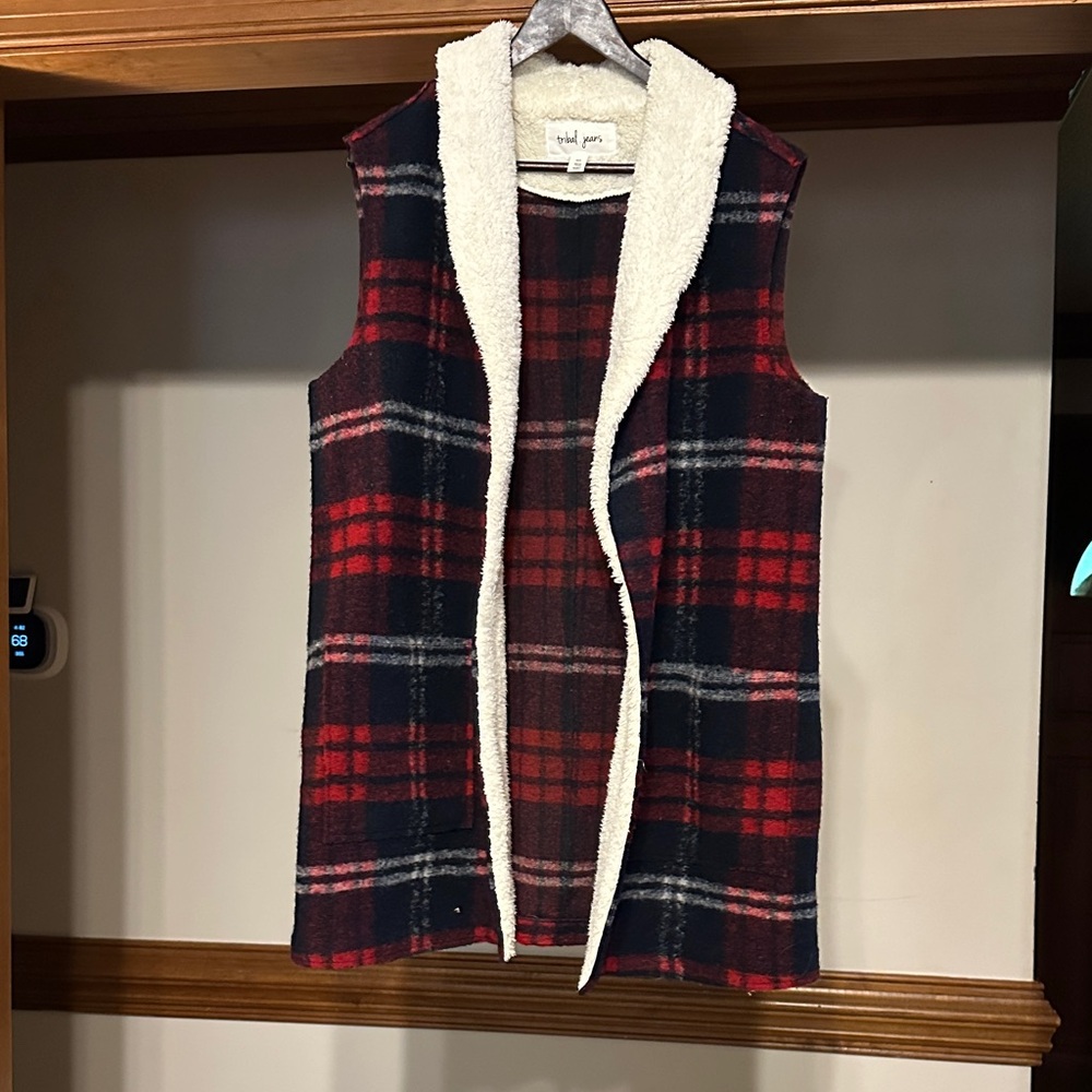 Tribal Jeans Red and Black Plaid Wool Vest with Sherpa Lining around collar.
